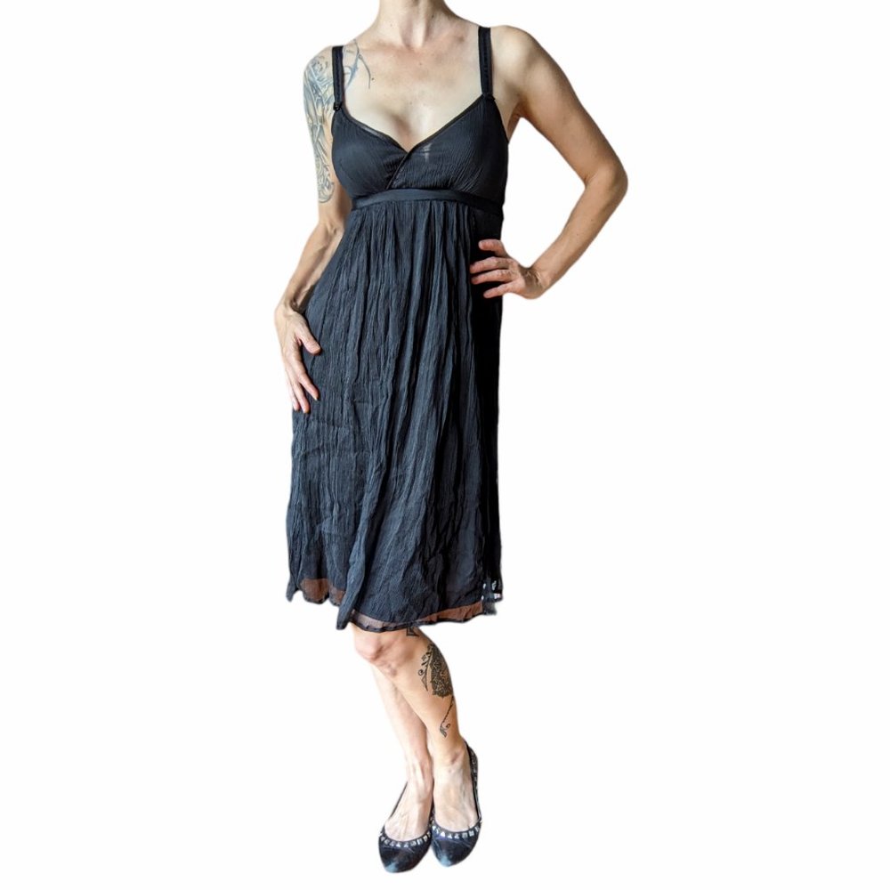 Black silk crepe sleeveless cross heart dress with empire waist